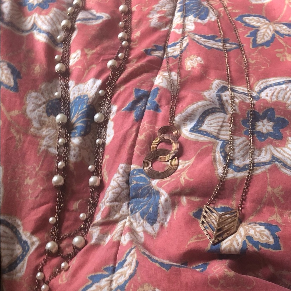 Chic Gold and Pearl Necklace by [Brand]